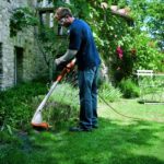 Тример електричний FSE31 STIHL (48150114103) у робочому положенні — оригінал